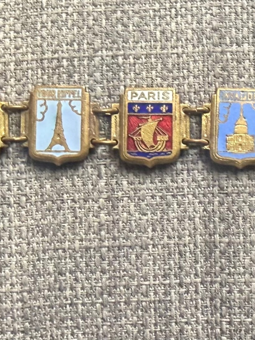 A vintage 60s gold tone souvenir bracelet